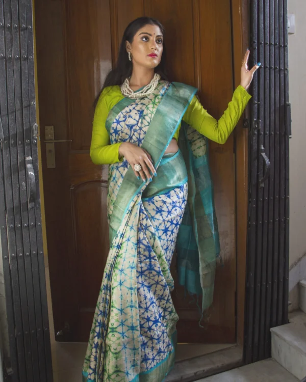 green abstract print saree