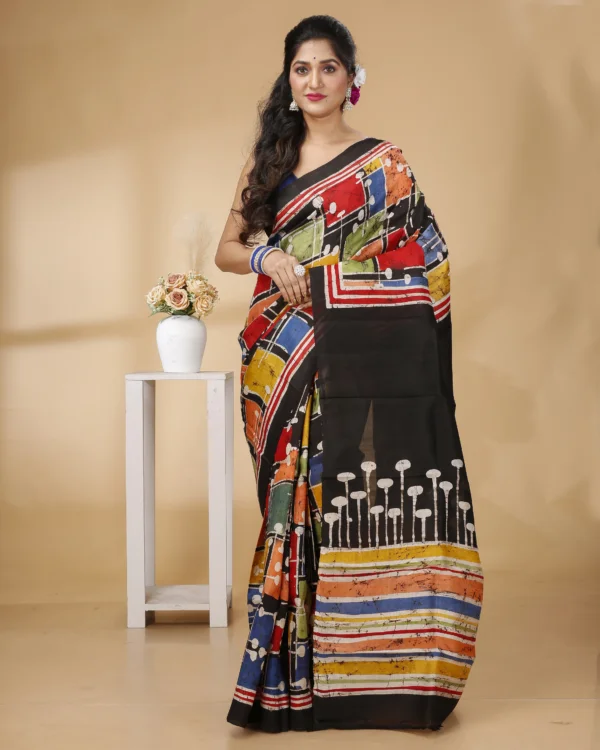 Nakshipar Black & Multicolour Batik on Pleats & Pallu With Reddish Orange Saree