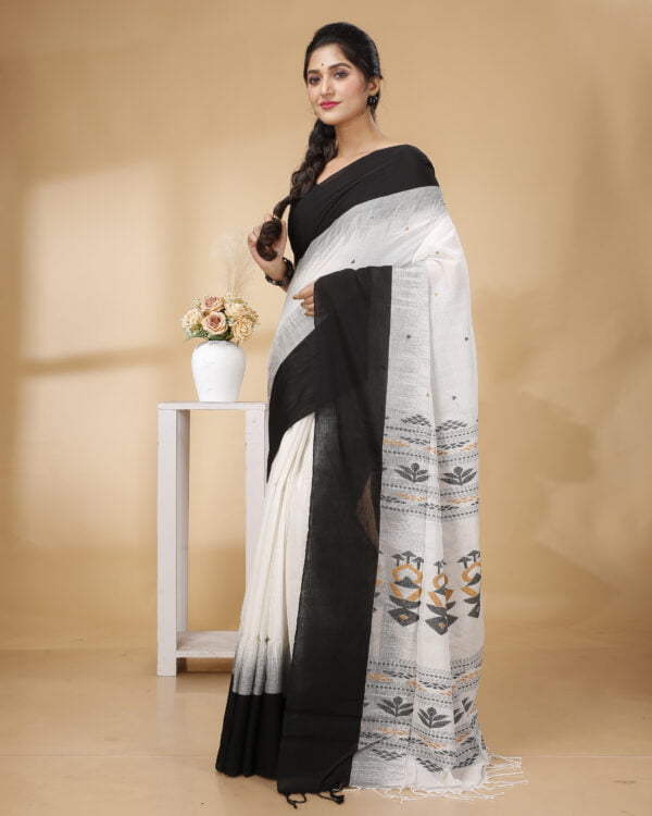 Nakshipar Black Border white base Cotton handloom saree.