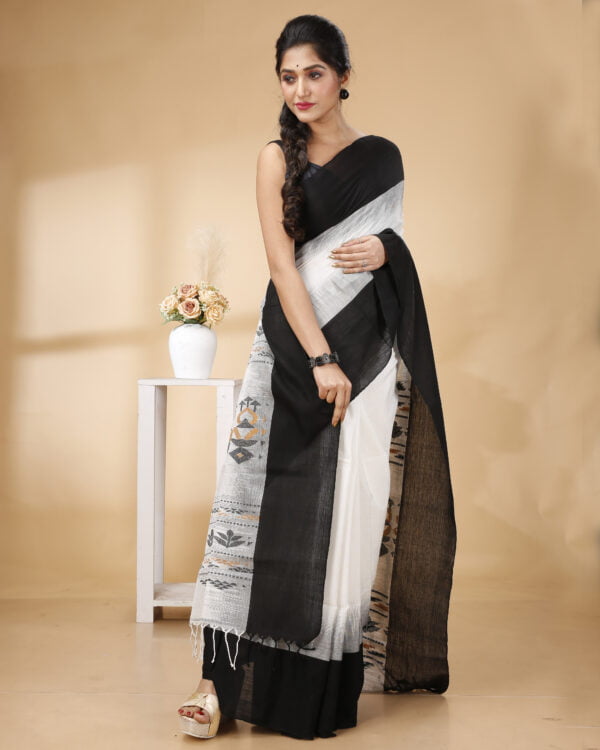 Nakshipar Black Border white base Cotton handloom saree.