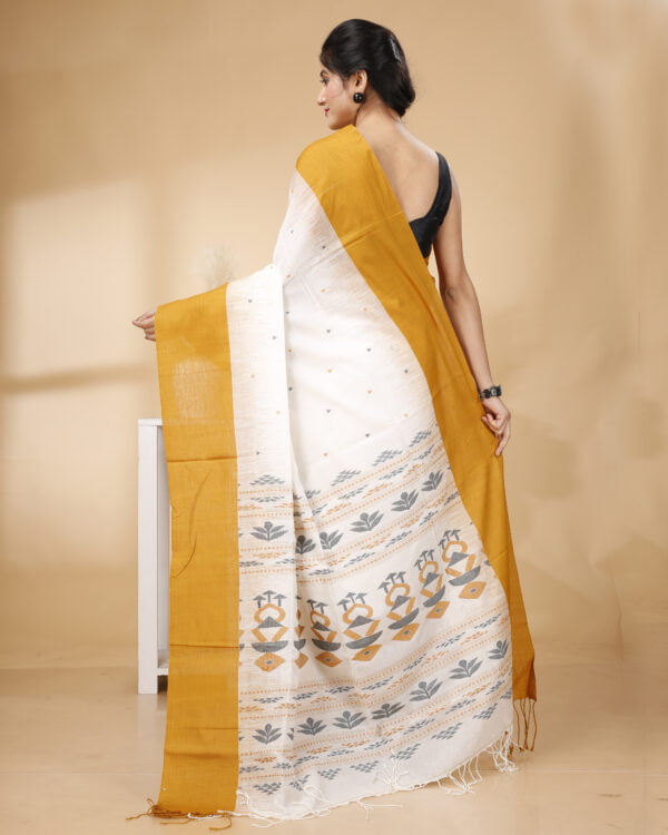 Nakshipar's Occur Yellow Border white base Cotton handloom saree