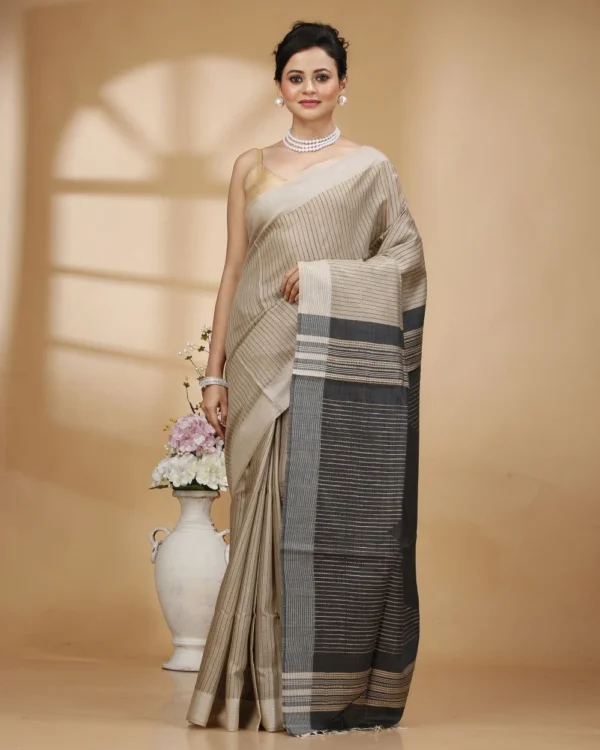 Black weaved stripes on Baige colour saree with Black designer pallu