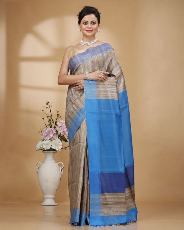 Nakshipar Gray Color Gicha Tussar Saree with Blue Pallu