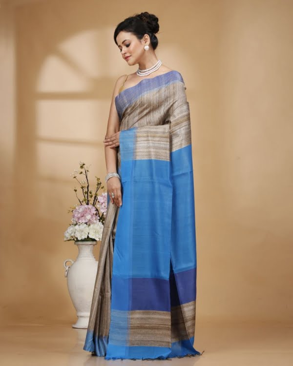 Nakshipar Gray Color Gicha Tussar Saree with Blue Pallu