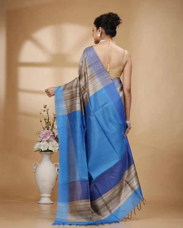 Nakshipar Gray Color Gicha Tussar Saree with Blue Pallu