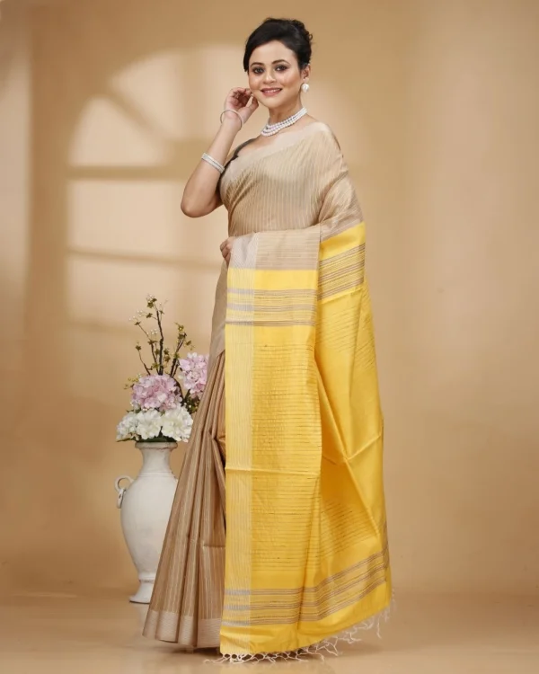 Yellow Weaved Stripes on Baige colour Saree with Yellow Designer Pallu