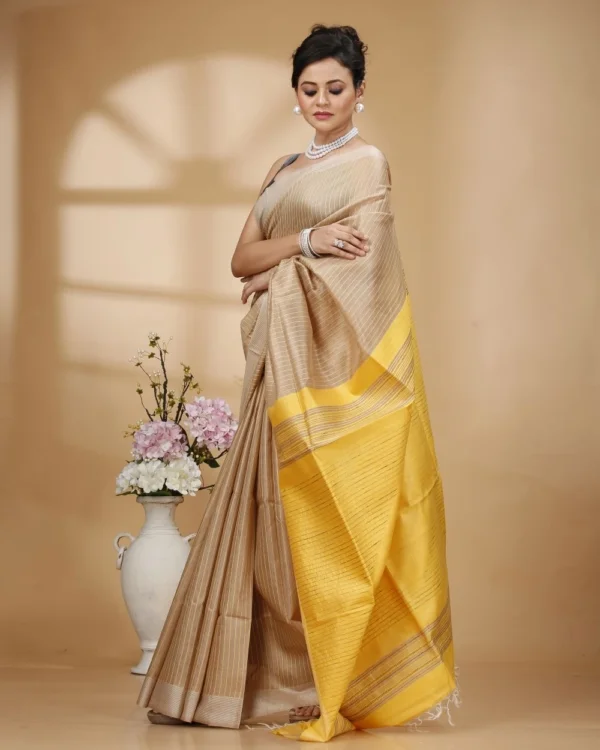 Yellow Weaved Stripes on Baige colour Saree with Yellow Designer Pallu