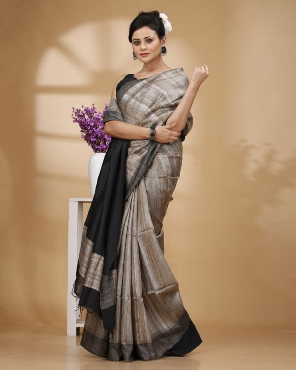 Nakshipar Gray Colour Gicha Tussar Saree with Black Pallu