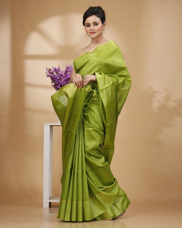 Self-Check on Parrot Green Base with Zari Border Saree