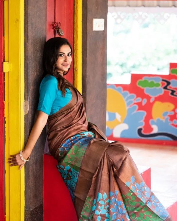 Nakshipar Green, Blue & Sky Blue Pagely Design on Deep Brown Zari Border Tussar Saree