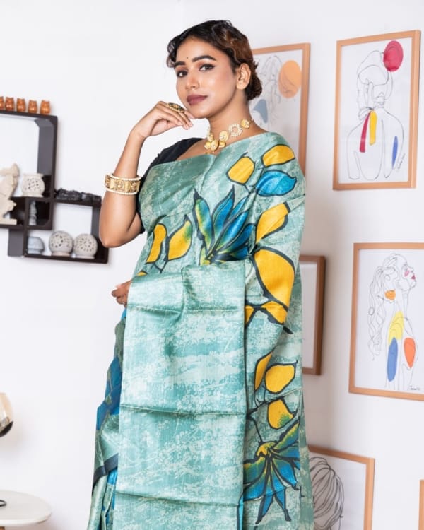 Nakshipar Blue, Black and Yellow Floral on Sea Green Self Printed Tussar Saree