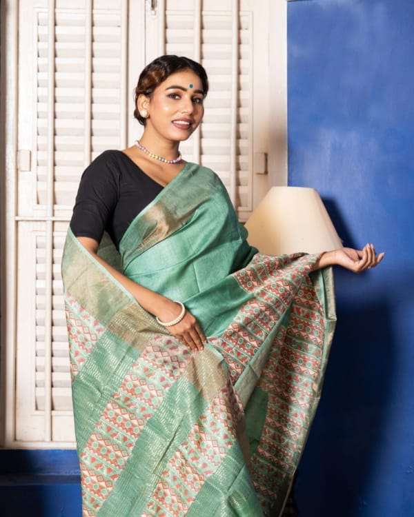 Nakshipar Deep Sea Green & Orange Abstract Print on Sea Green Zari Border Tussar Saree