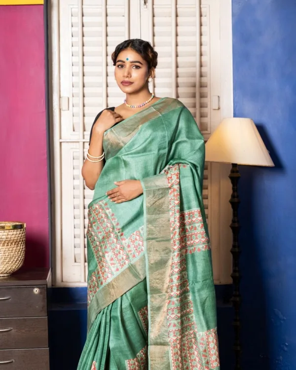 Nakshipar Deep Sea Green & Orange Abstract Print on Sea Green Zari Border Tussar Saree