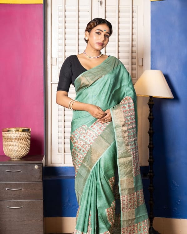 Nakshipar Deep Sea Green & Orange Abstract Print on Sea Green Zari Border Tussar Saree