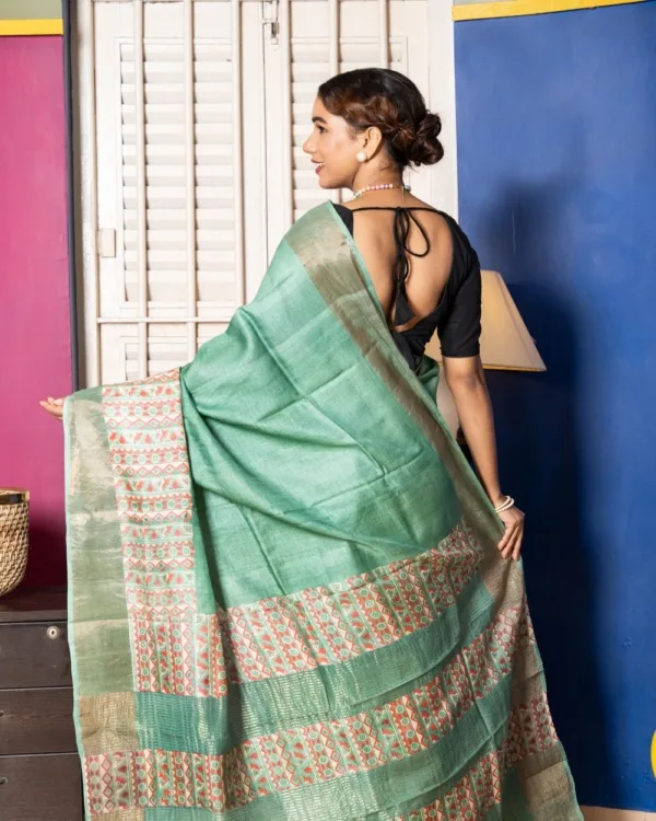 Nakshipar Deep Sea Green & Orange Abstract Print on Sea Green Zari Border Tussar Saree