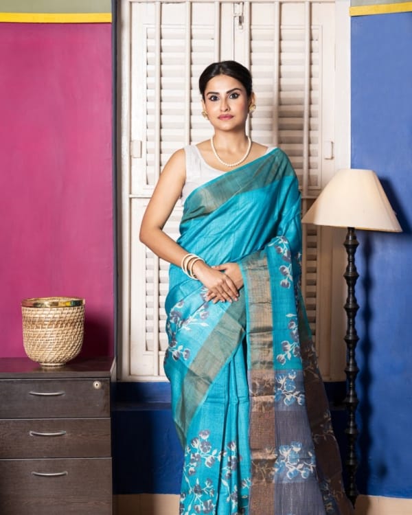 Nakshipar Off White & Deep Gray Floral Design on Sea Green Zari Border Tussar Saree