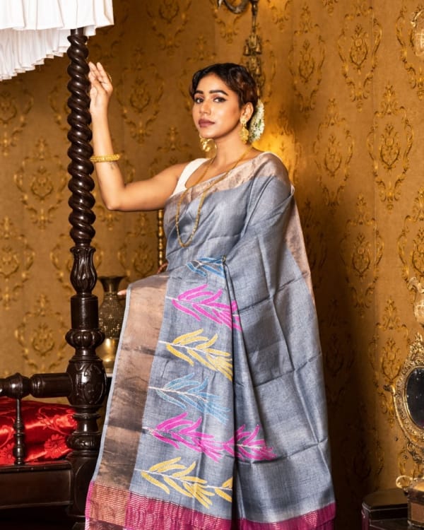 Nakshipar Yellow, Pink & Blue print on Gray Zari Border Tussar Saree